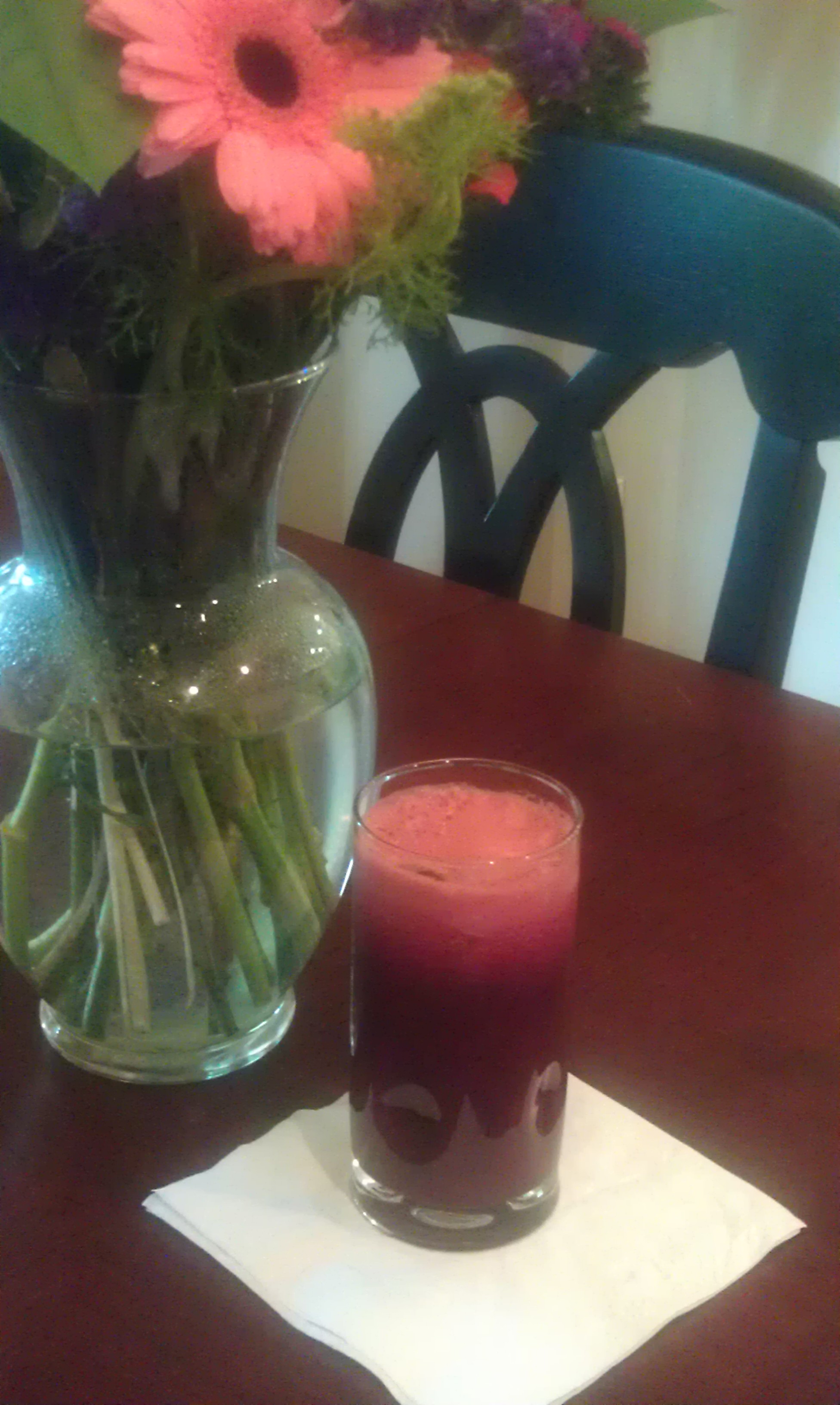 a bright pink juice made from fruits and vegetables